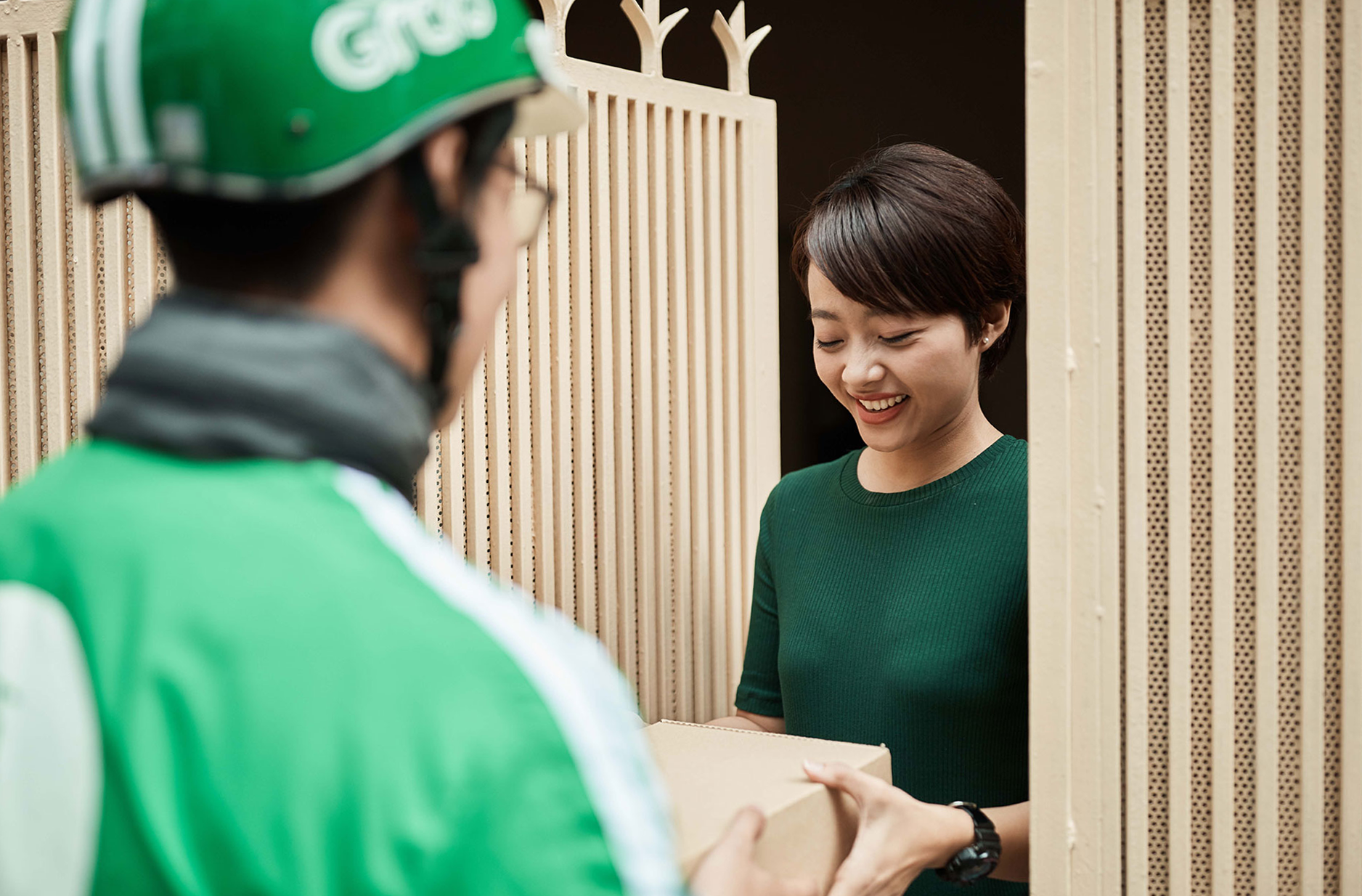 GrabExpress delivery app showing Welcome to Delivery screen with delivery status tracking